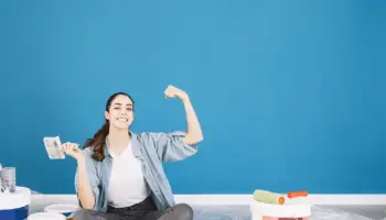 woman done with a wall on a painting job